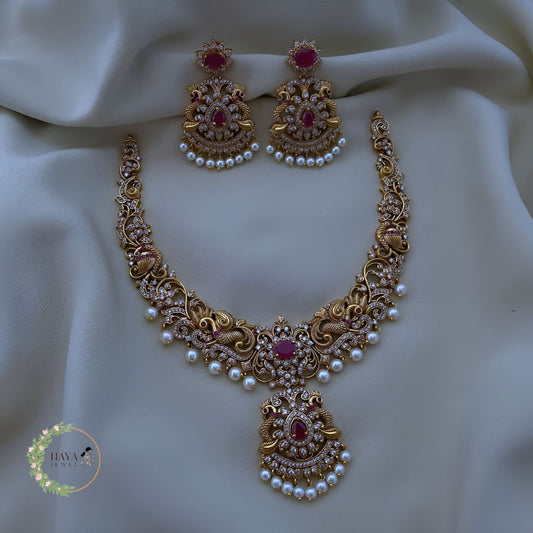 Buy Peacock Matte Gold Finish Haram Necklace Jhumka Earrings AD Ruby Green Kemp Stones